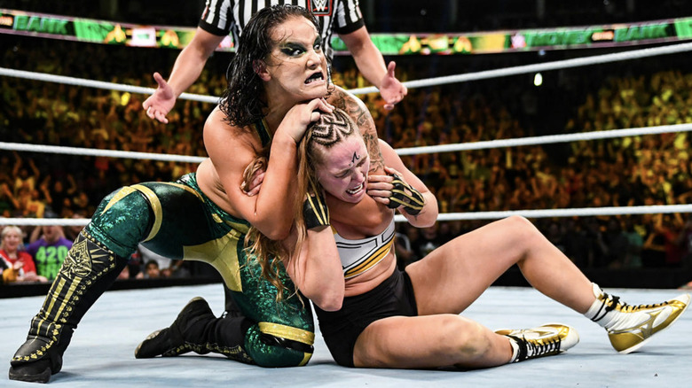 Shayna Baszler attacking Ronda Rousey