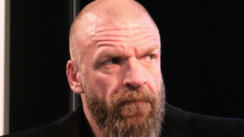 Triple H looking to the side