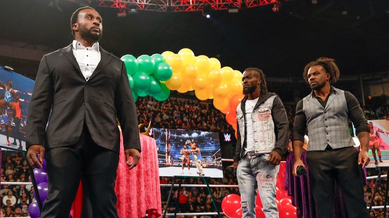 The New Day (Kofi Kingston, Xavier Woods, and Big E) stand together in the ring before going their separate ways