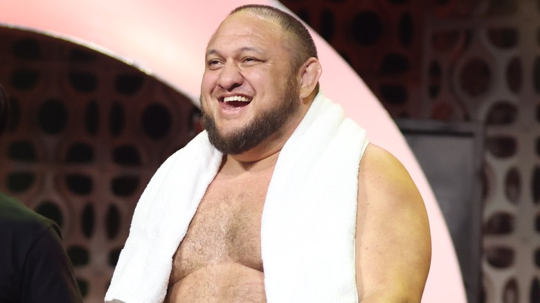 Samoa Joe, who can't hear you because he's wearing a towel