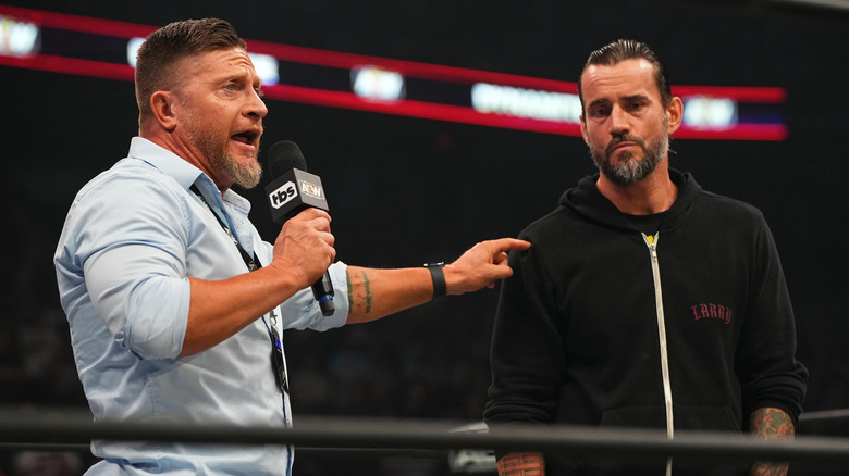 Ace Steel pointing at CM Punk