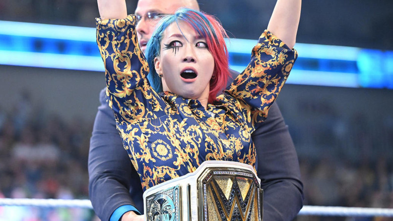 Asuka wearing new championship