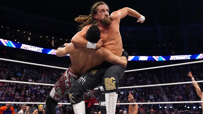 Jay White hitting Blade Runner on Rocky Romero