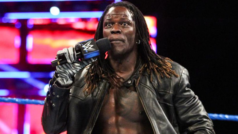 R-Truth holding a microphone