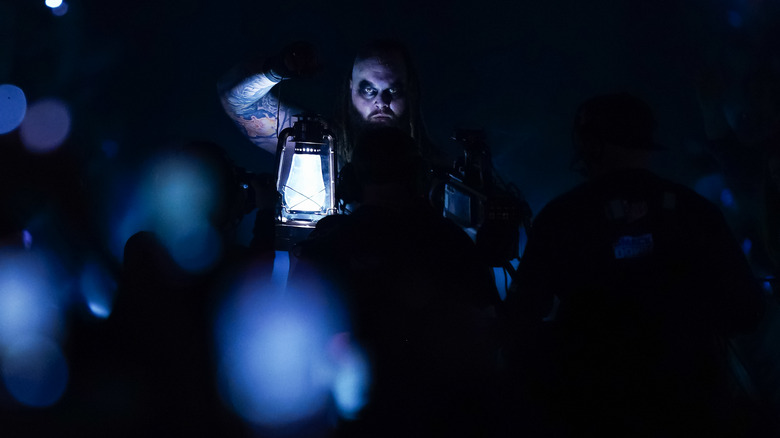 Bray Wyatt makes his entrance with trademark lamp