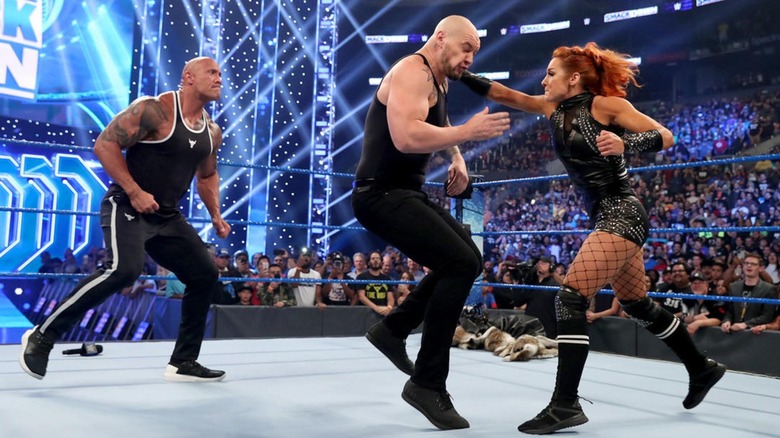 Becky Lynch And The Rock Beat Up On Baron Corbin