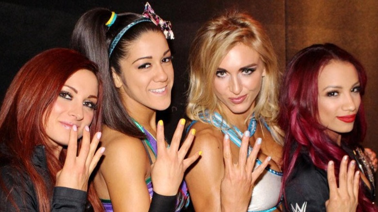 NXT's Four Horsewomen hold up hands