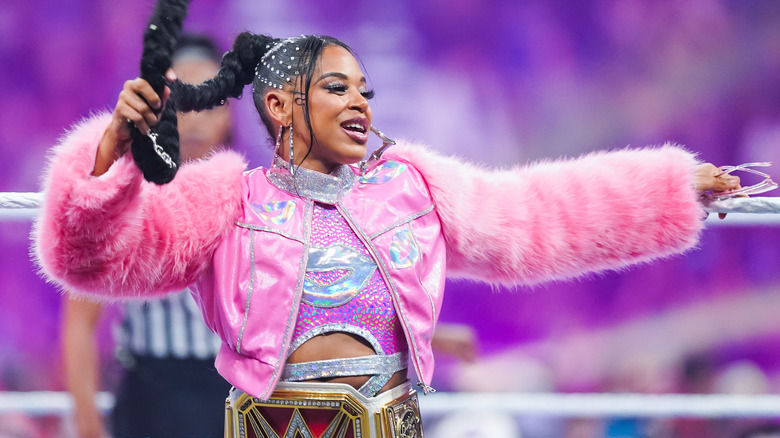 Bianca Belair swinging her hair