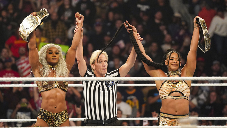 Jade Cargill and Bianca Belair pose with Women's Tag Team titles during Friday night Smackdown at KeyBank Center on November 8, 2024 in Buffalo, New York.