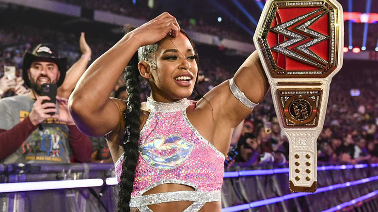 Bianca Belair looking at her championship