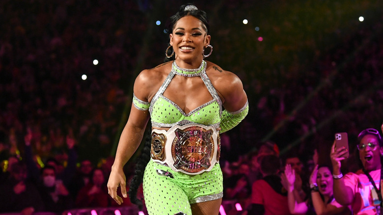 Bianca Belair makes her Royal Rumble entrance with her Tag Team Championship belt