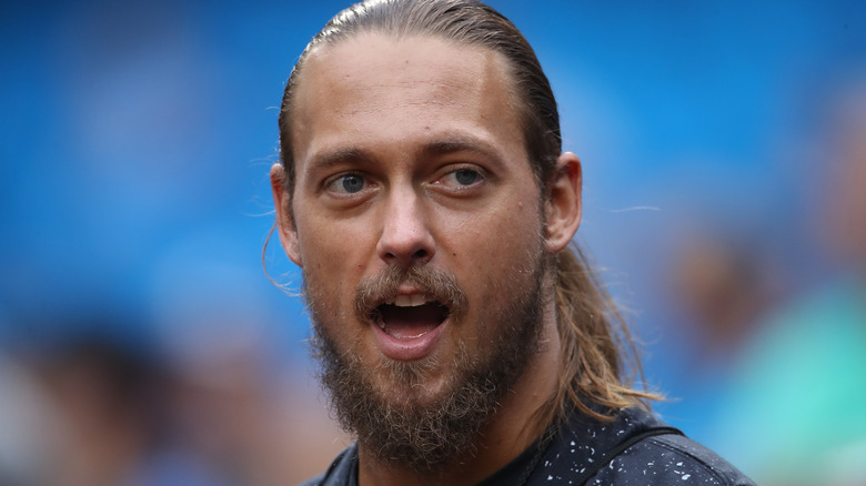 WWE wrestler William Morrissey AKA Big Cass watches batting practice before the start of the New York Yankees MLB game against the Toronto Blue Jays at Rogers Centre on August 8, 2017 in Toronto, Canada.