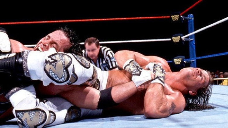 Shawn Michaels putting Bret Hart in an armbar