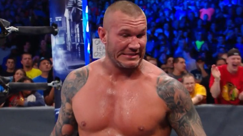 Randy Orton grimacing ringside