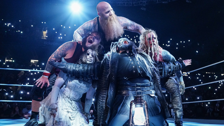 Nikki Cross, Joe Gacy, Erick Rowan, Bo Dallas, and Dexter Lumis of the Wyatt Sicks celebrate their win during Monday Night RAW at CFG Bank Arena on August 5, 2024 in Baltimore, Maryland.