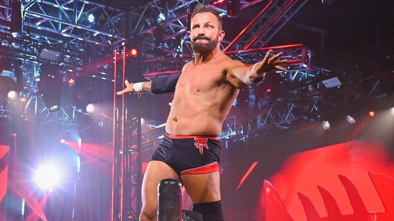 Bobby Fish posing on the top turnbuckle