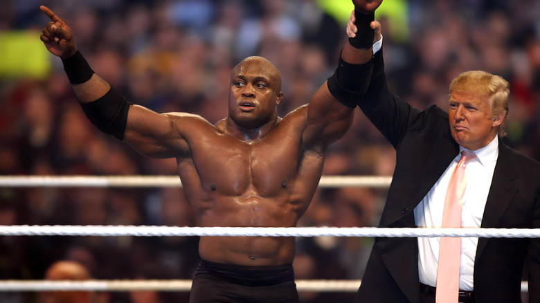 Donald Trump raising Bobby lashley's hand at WrestleMania 23