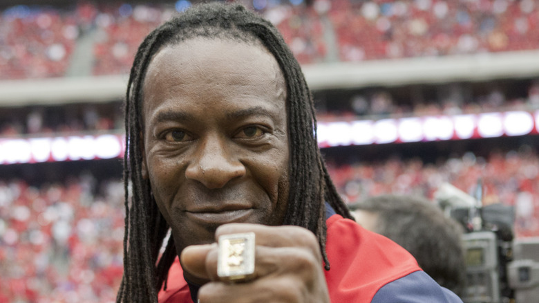 Booker T posing with his WWE Hall of Fame ring