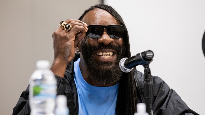 Booker T smiling in shades