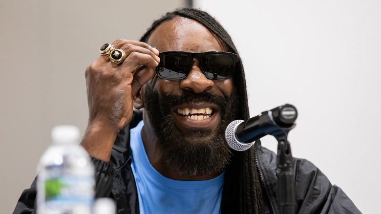 Booker T smiling in shades