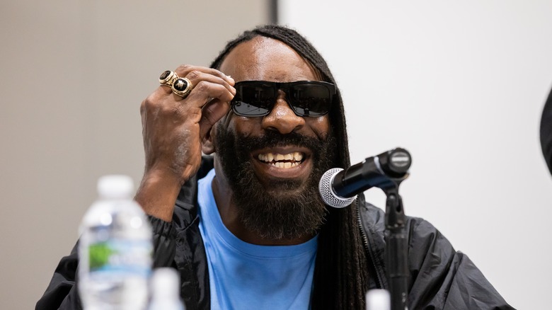 Booker T smiling in shades