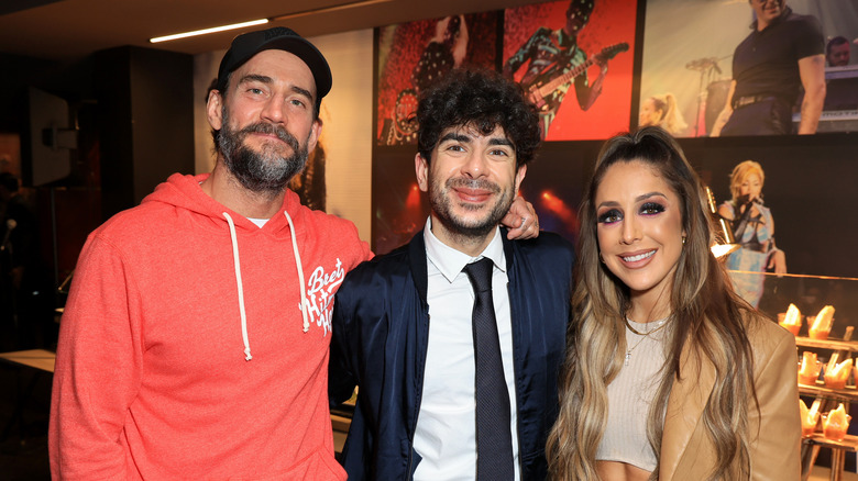 CM Punk, Tony Khan and Britt Baker in happier times