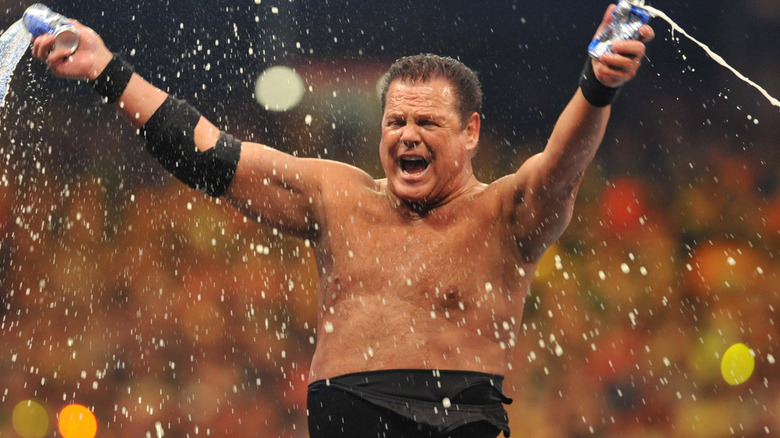 Jerry Lawler celebrates in the ring