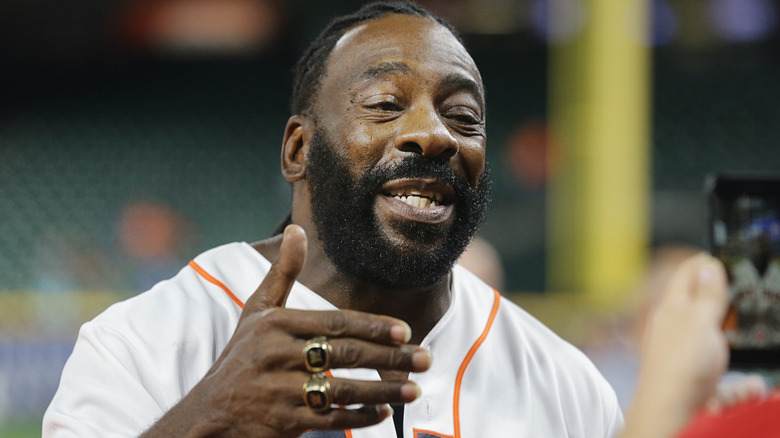 Booker T wearing his WWE Hall of Fame rings