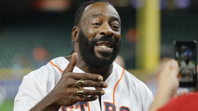 Booker T wearing his WWE Hall of Fame rings