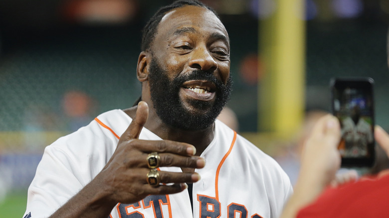 Booker T wearing his WWE Hall of Fame rings