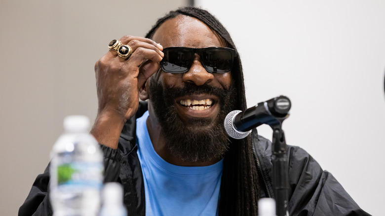 Booker T smiling in shades