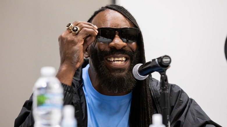 Booker T smiling in shades