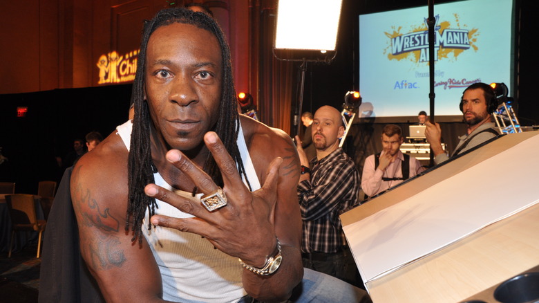 Booker T gesturing, smiling