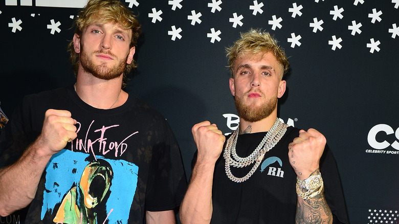 Jake Paul poses with his brother Logan