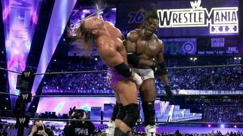 Brian Gewirtz Gives Insight Into Why Triple H Beat Booker T At Wwe