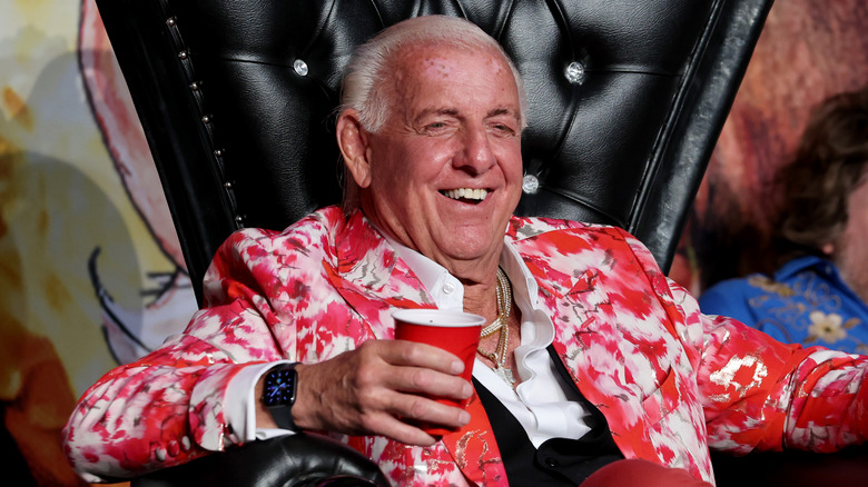 Ric Flair laughs with solo cup