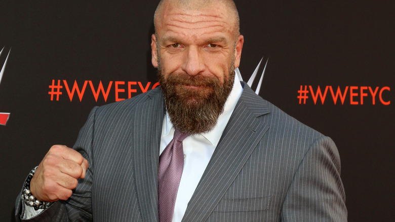 Triple H with clenched fist