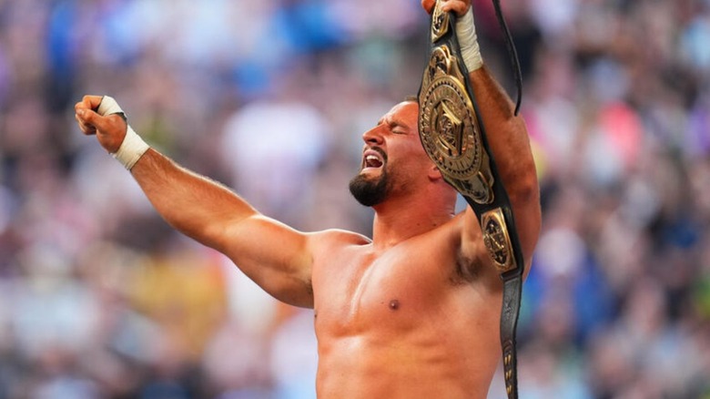 Bron Breakker holds up his newly-won Intercontinental Championship after defeating Sami Zayn at SummerSlam.