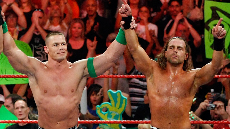 John Cena and Shawn Michaels in the ring
