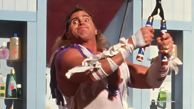 Brutus "The Barber" Beefcake poses