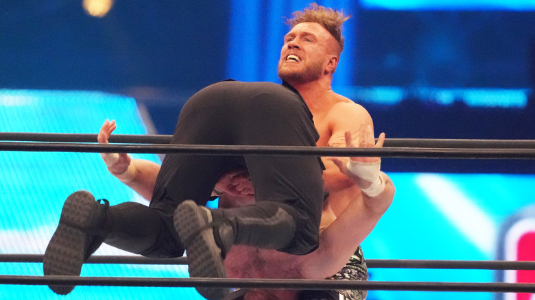 Will Ospreay lifts a man
