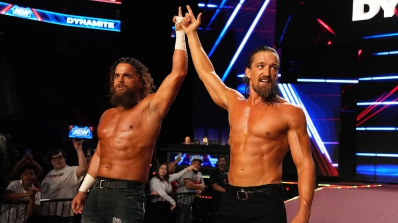Jay White and Juice Robinson hold the guns up