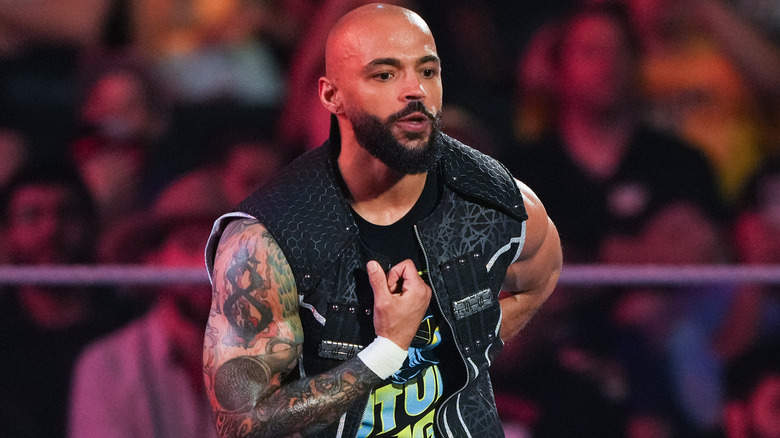 Ricochet wearing a sleeveless jacket