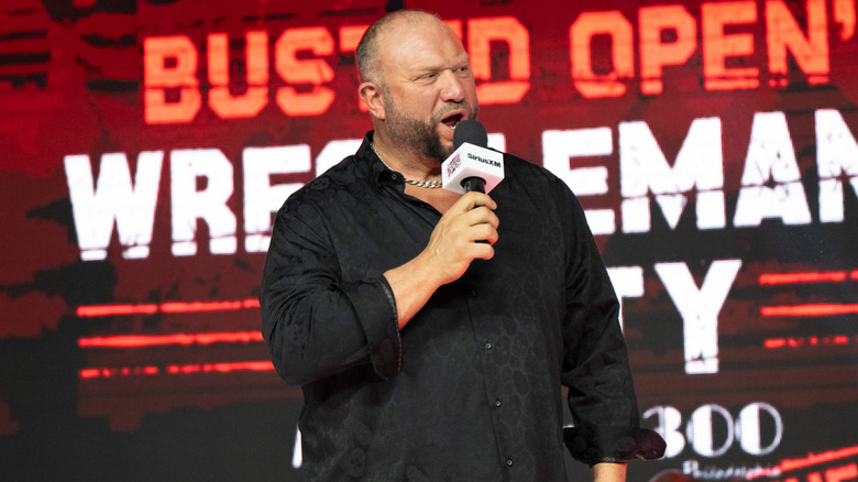 Bully Ray holding a microphone at a Busted Open event