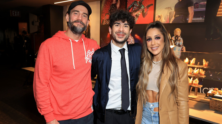 Tony Khan with CM Punk and Britt Baker