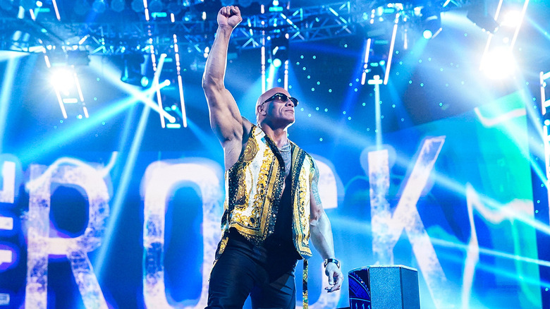 The Rock posing in the ring