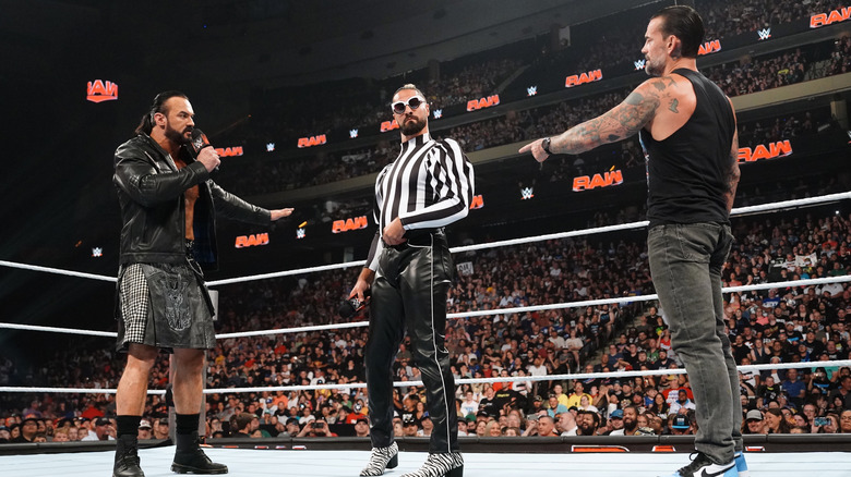 Drew McIntyre, Seth Rollins, and CM Punk during their Raw segment