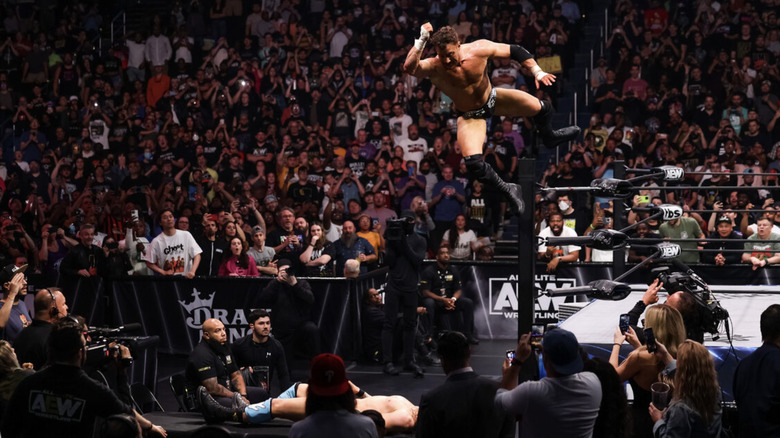 MJF hitting an elbow drop on Adam Cole