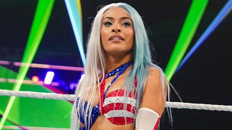 Zelina Vega wearing red, white, and blue ring gear