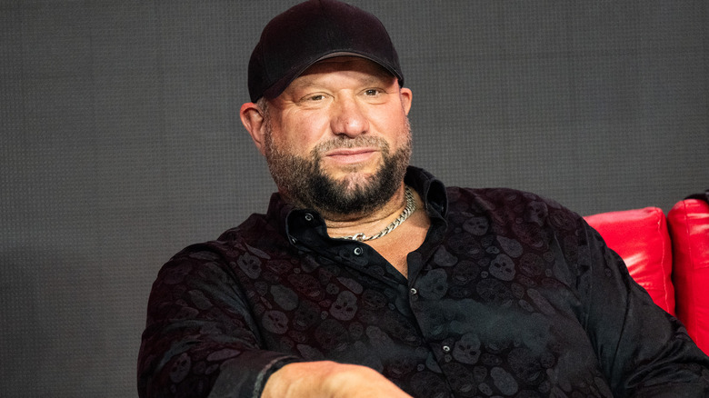 Bully Ray sitting down and smiling